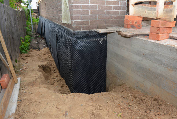 SJ Waterproofing Pros technician performing targeted Waterproofing assessment in Pell City, AL